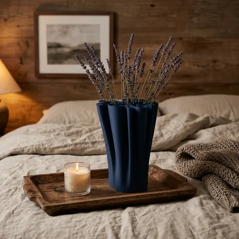 Folderoo in Navy: a fluted vase of lavender on a linen bed